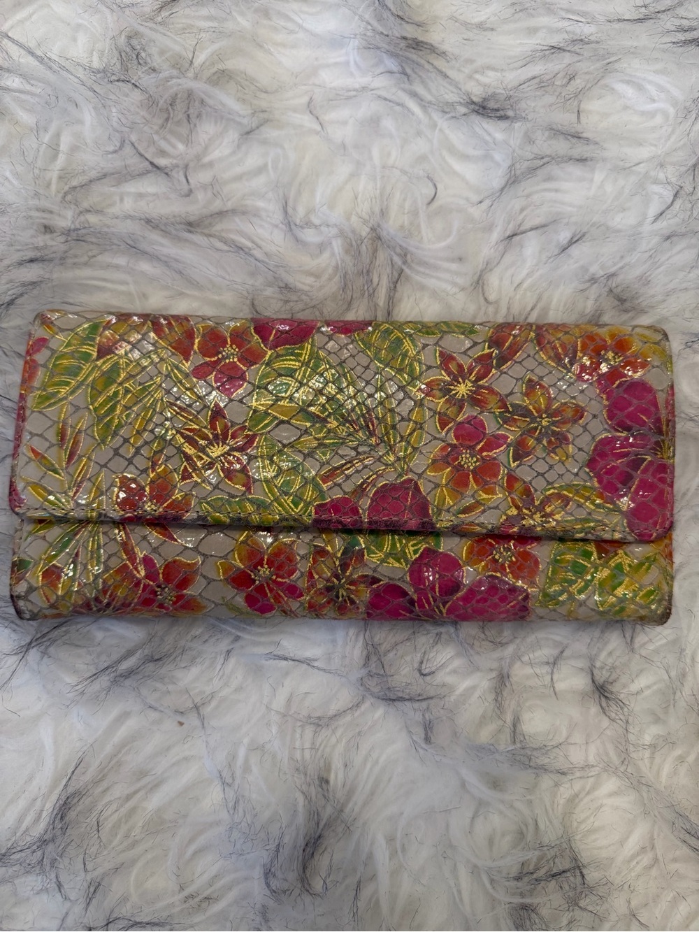Hobo international Lauren clutch wallet featuring a vibrant floral design